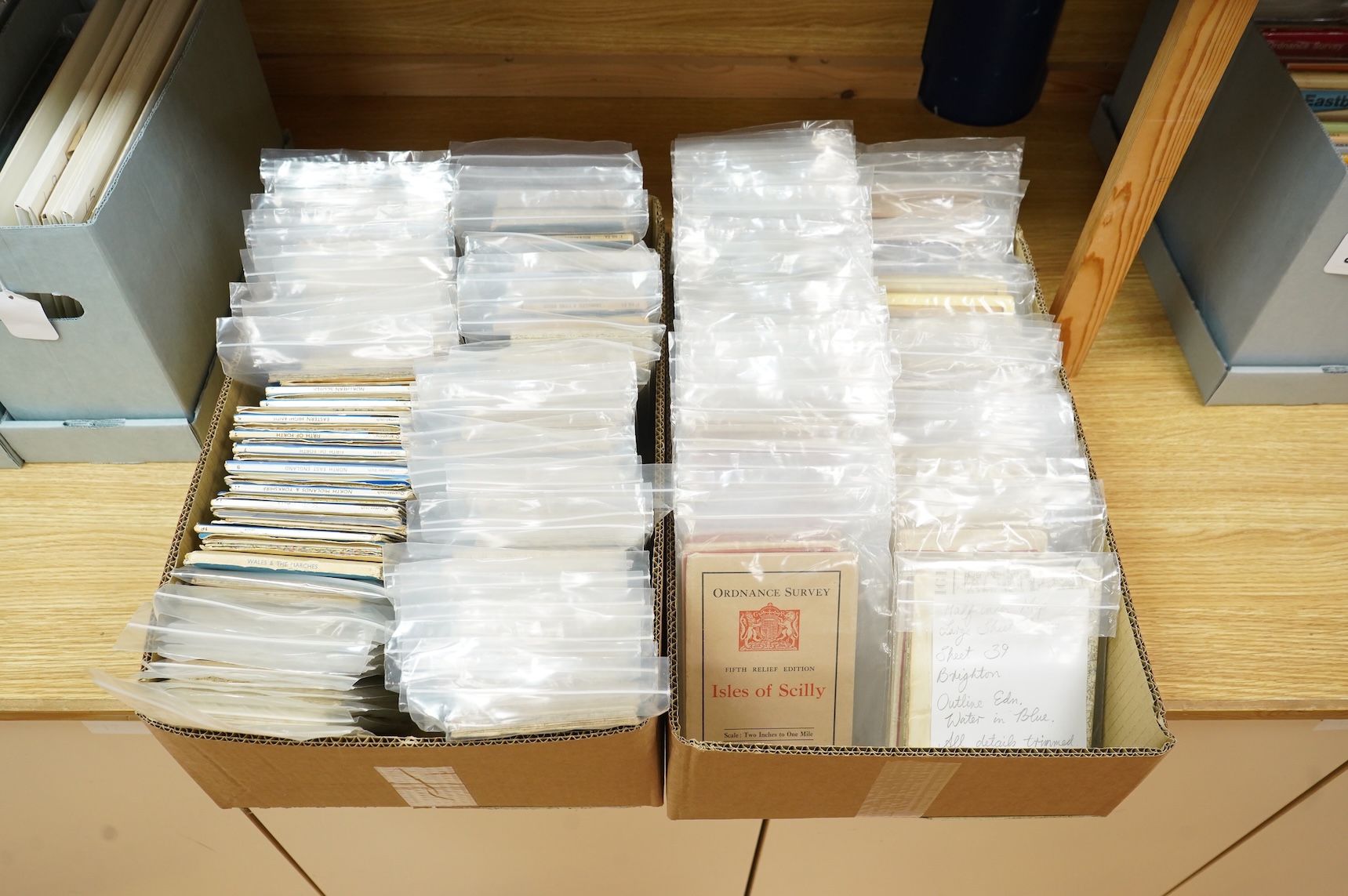 A collection of Ordnance Survey maps including Explorer series 1:25,000, Seventh Series One Inch, together with miscellaneous touring and historic editions (3 boxes)